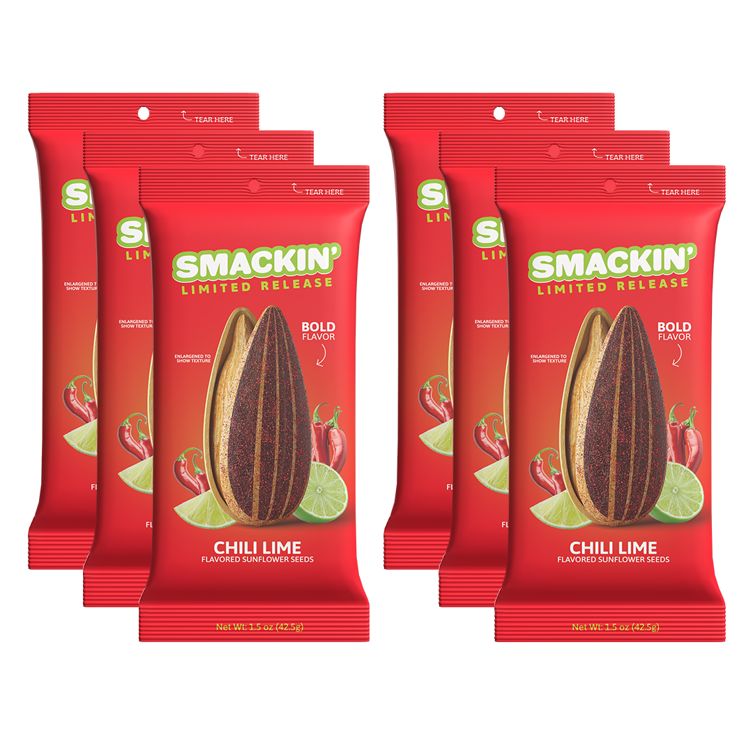 Six red Smakin' Limited Release Chili Lime flavored sunflower seed packets, each prominently displaying an enlarged seed, red chili peppers, and green lime slices
