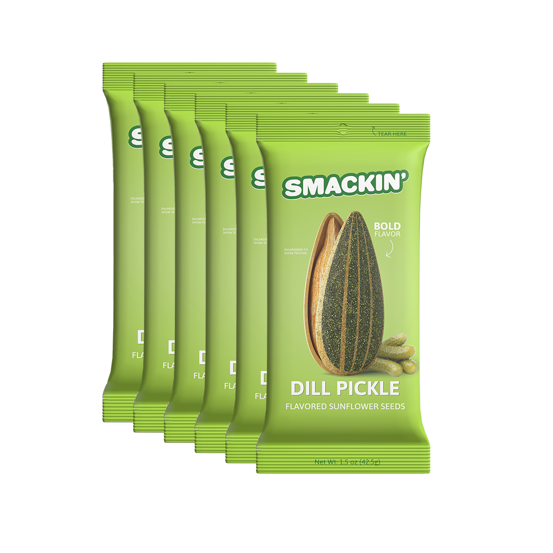 Product photography of six bright green Smackin' Dill Pickle Flavored Sunflower Seeds bags, each featuring an enlarged dill-seasoned sunflower seed and three miniature pickles, emphasizing bold flavor