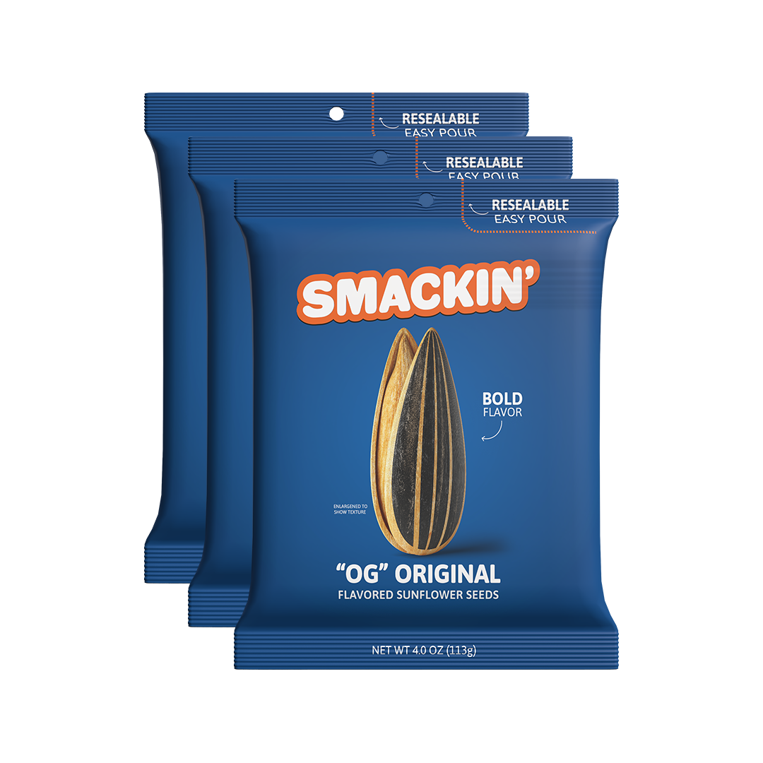 Product photography of three dark blue Smakin' OG Original Flavored Sunflower Seeds bags prominently featuring an orange Smakin' logo, a realistic striped sunflower seed illustration, and resealable easy pour tops