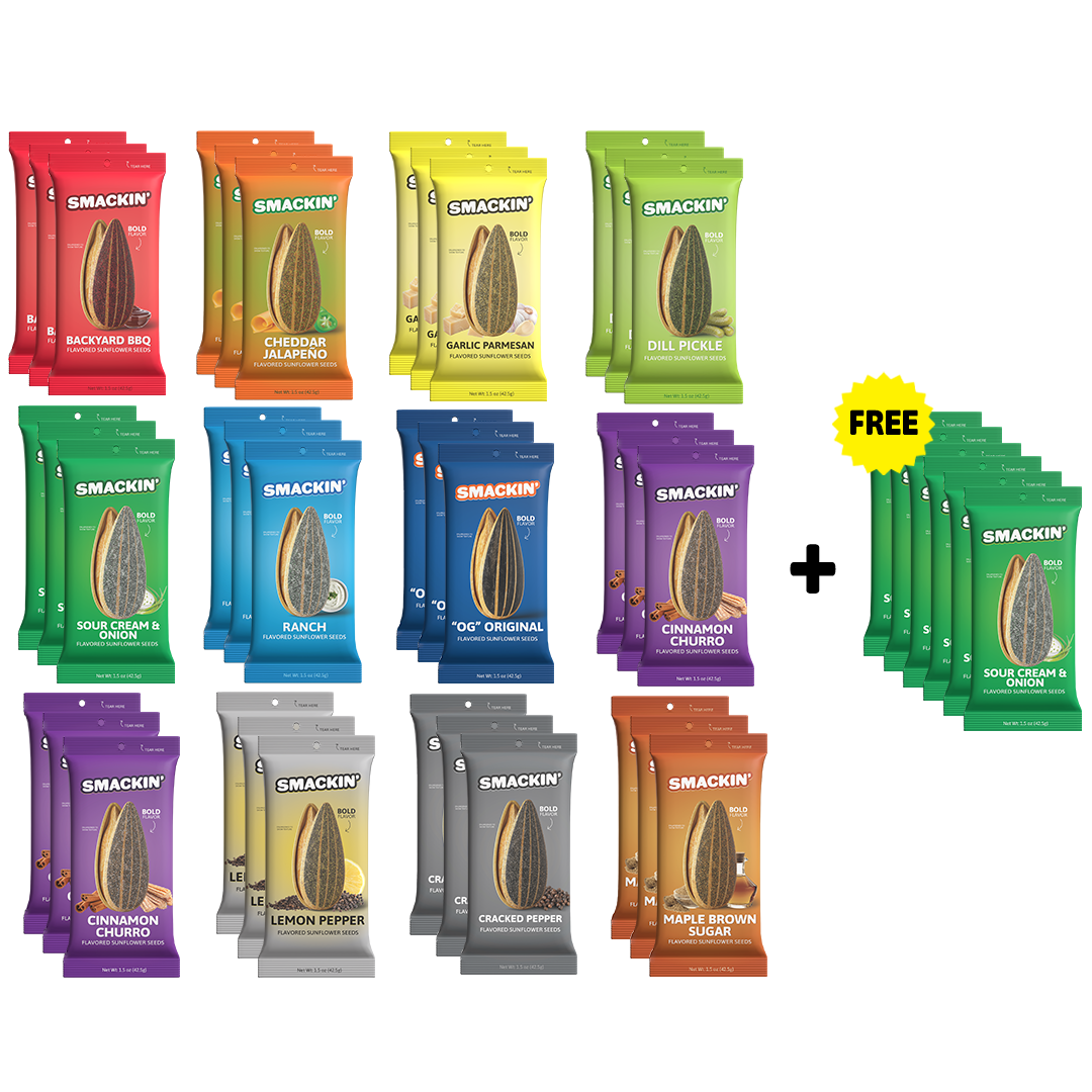 Product photography of Smakin' Bold Flavored Sunflower Seeds showcasing a wide variety of colorful packaging for eleven distinct flavors including red Backyard BBQ, green Dill Pickle, purple Cinnamon Churro, and a yellow starburst promoting free Sour Cream & Onion packs