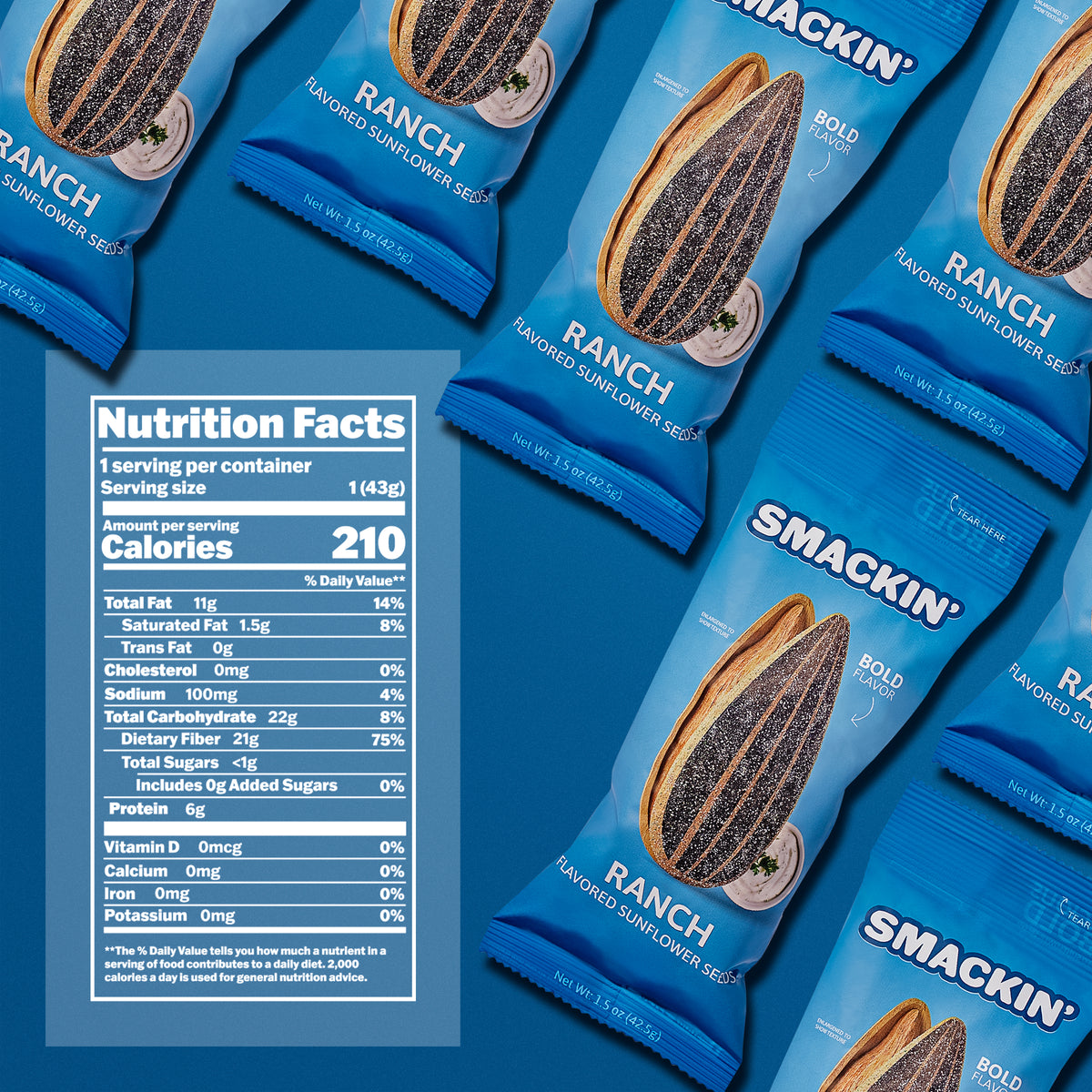 Studio shot of several vibrant blue packages of Smackin' Ranch Flavored Sunflower Seeds featuring a bold sunflower seed graphic and a small bowl of ranch dip, with a detailed white Nutrition Facts label showing 210 calories prominently on the left