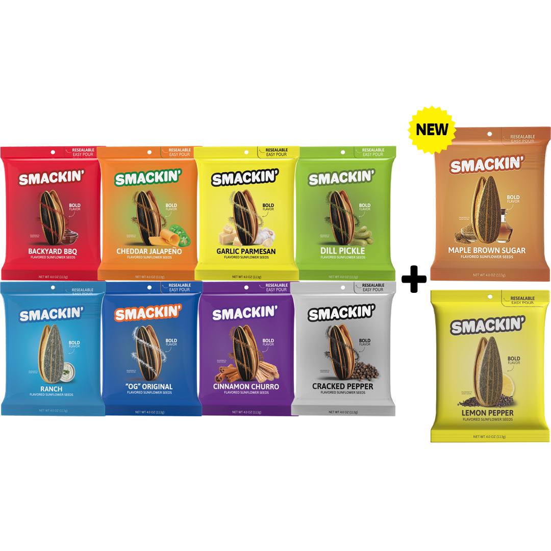 Product photography of eleven Smakin' flavored sunflower seed pouches including a new Maple Brown Sugar flavor with a NEW sticker vibrant red Backyard BBQ and zesty yellow Lemon Pepper all in resealable packaging on a white background