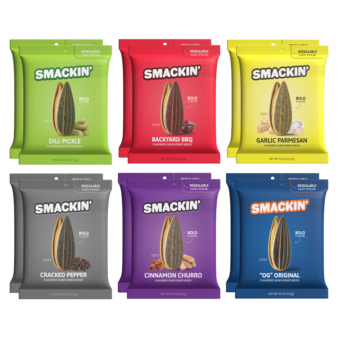 A diverse collection of Smackin' flavored sunflower seeds presented in six distinct colorful resealable pouches including green Dill Pickle, red Backyard BBQ, yellow Garlic Parmesan, gray Cracked Pepper, purple Cinnamon Churro, and blue OG Original