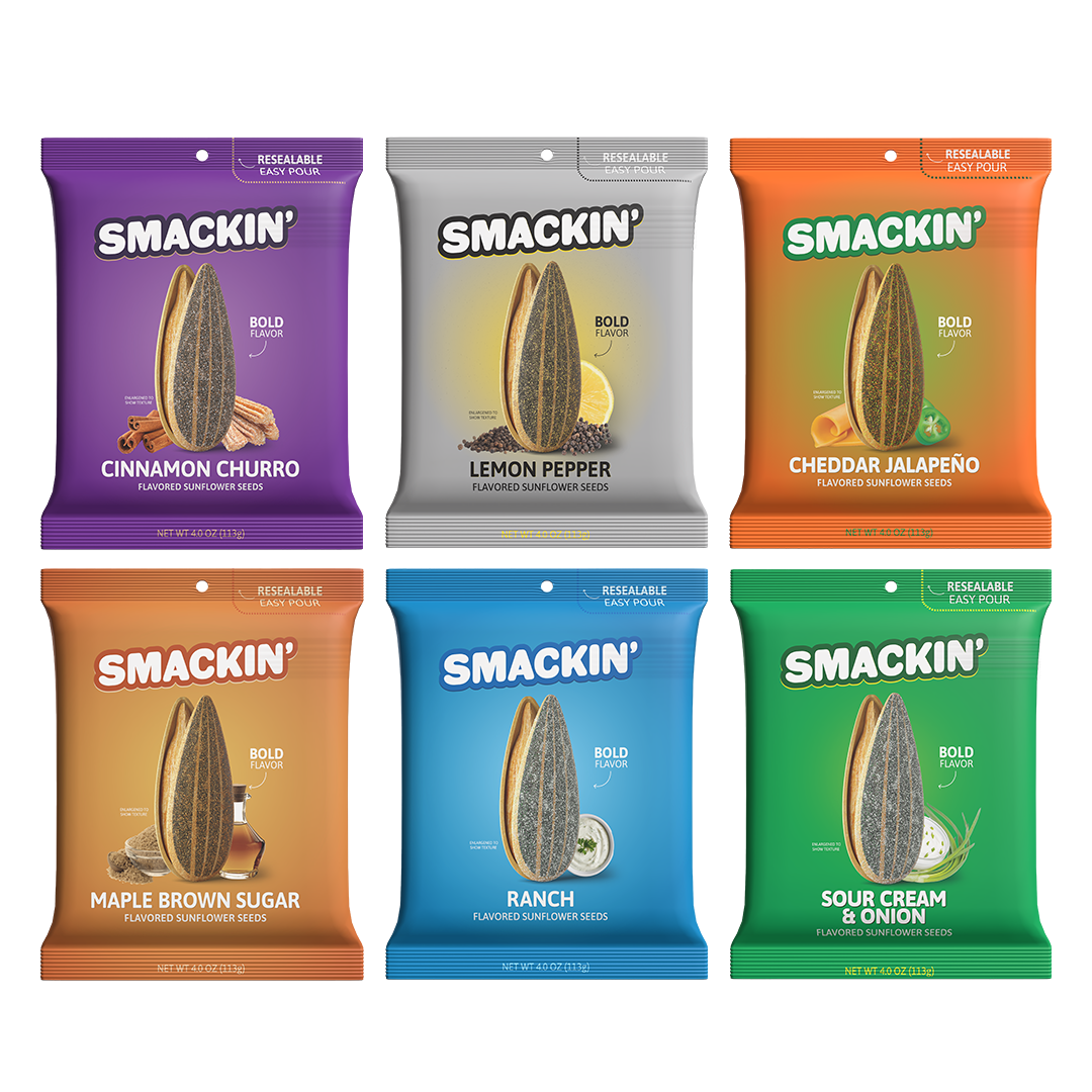 Product photograph of six vibrant Smackin' flavored sunflower seed pouches showcasing bold flavors like Cinnamon Churro Lemon Pepper and Cheddar Jalapeño each featuring a large sunflower seed graphic and corresponding ingredients with Resealable Easy Pour messaging