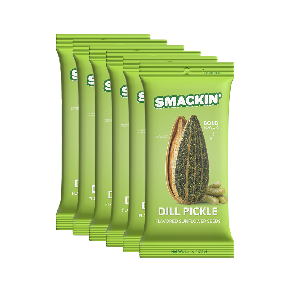 Product photography of six bright green Smackin' Dill Pickle Flavored Sunflower Seeds bags, each featuring an enlarged dill-seasoned sunflower seed and three miniature pickles, emphasizing bold flavor