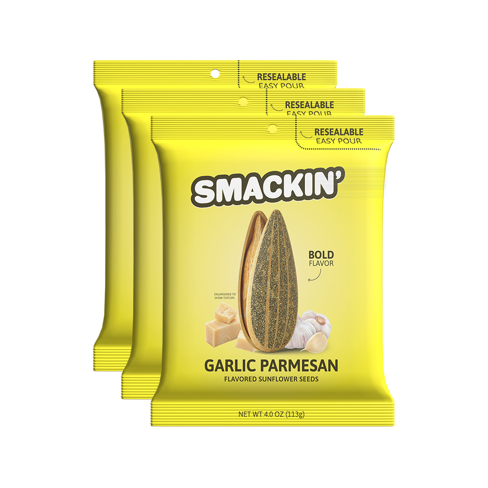 Product photography of three bright yellow Smakin' Garlic Parmesan flavored sunflower seed bags featuring a split seed, parmesan cheese, and garlic cloves, each with a resealable easy-pour top and bold flavor text