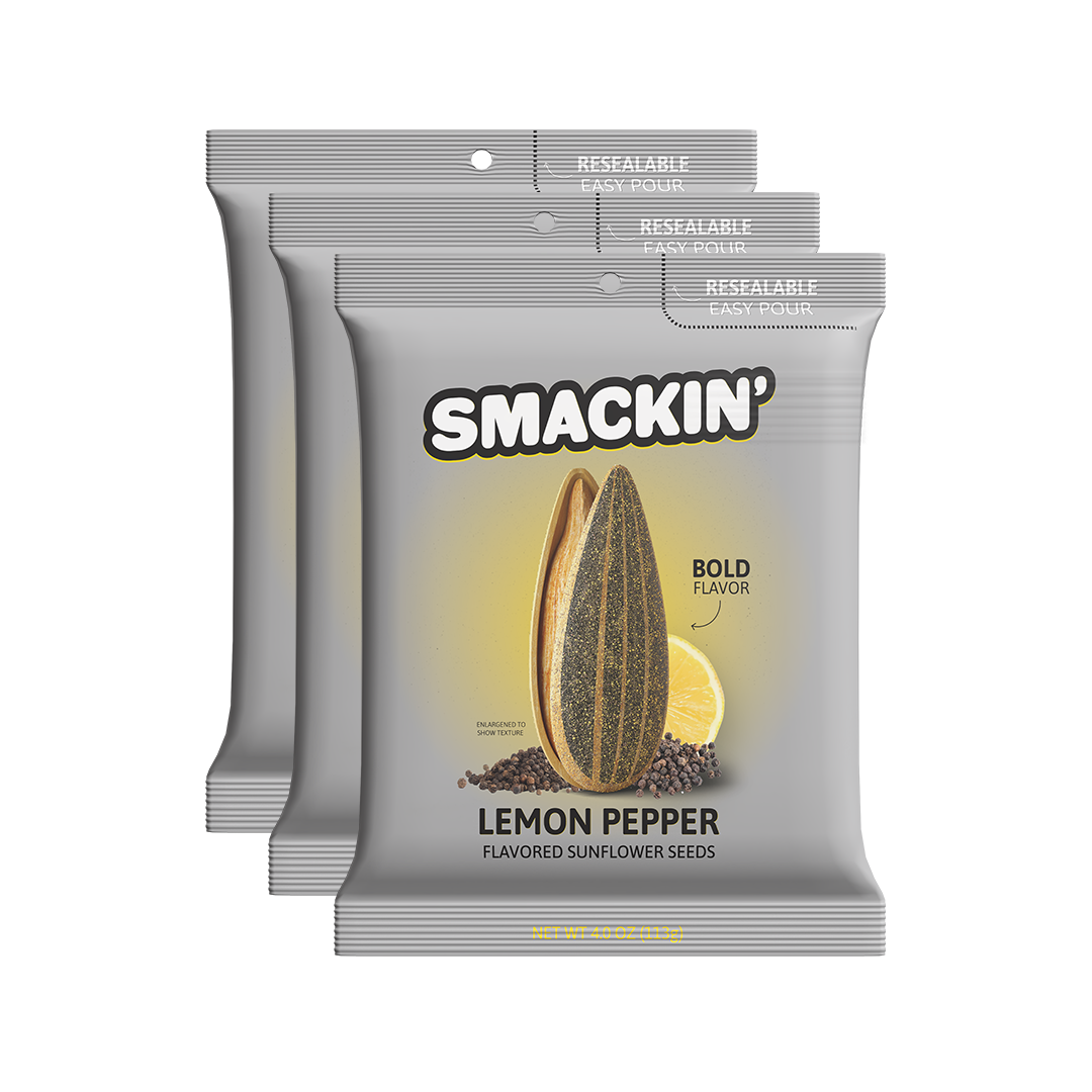 Product photography of three grey Smackin' Lemon Pepper flavored sunflower seed packages featuring 'Resealable Easy Pour' tops and a bold graphic of a split sunflower seed, lemon slice, and black peppercorns
