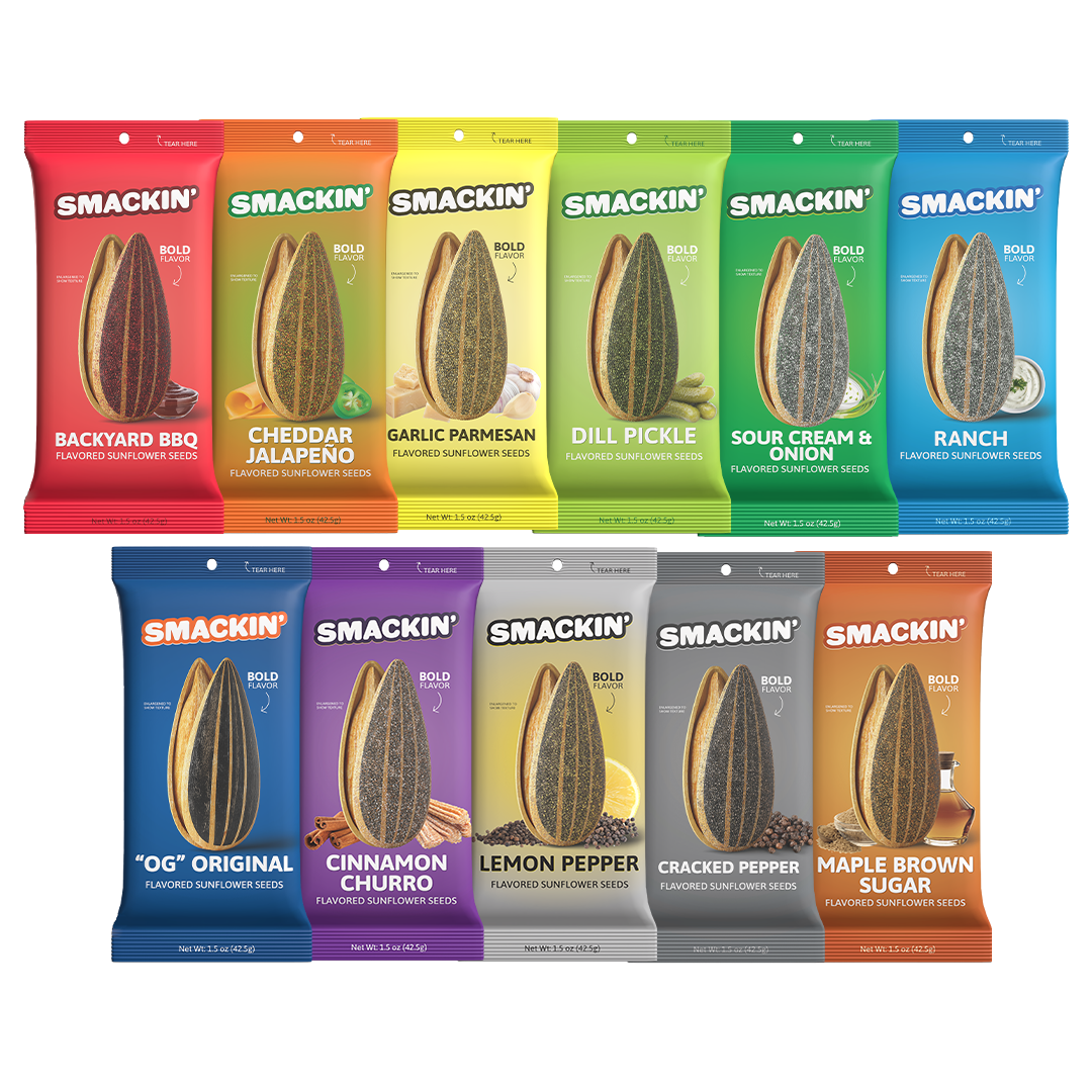 Digital photograph of ten colorful Smackin' Flavored Sunflower Seeds bags arranged on a white background, showcasing a variety of bold flavors including Backyard BBQ, Dill Pickle, and Cinnamon Churro