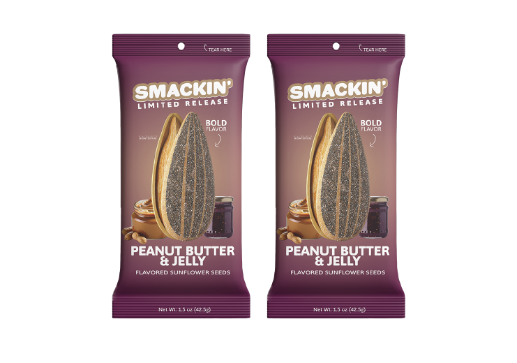 Product photography featuring two identical purple Smackin' Limited Release Peanut Butter & Jelly flavored sunflower seeds snack bags, each displaying a large sunflower seed, a swirl of peanut butter, a jar of purple jelly, and bold flavor text